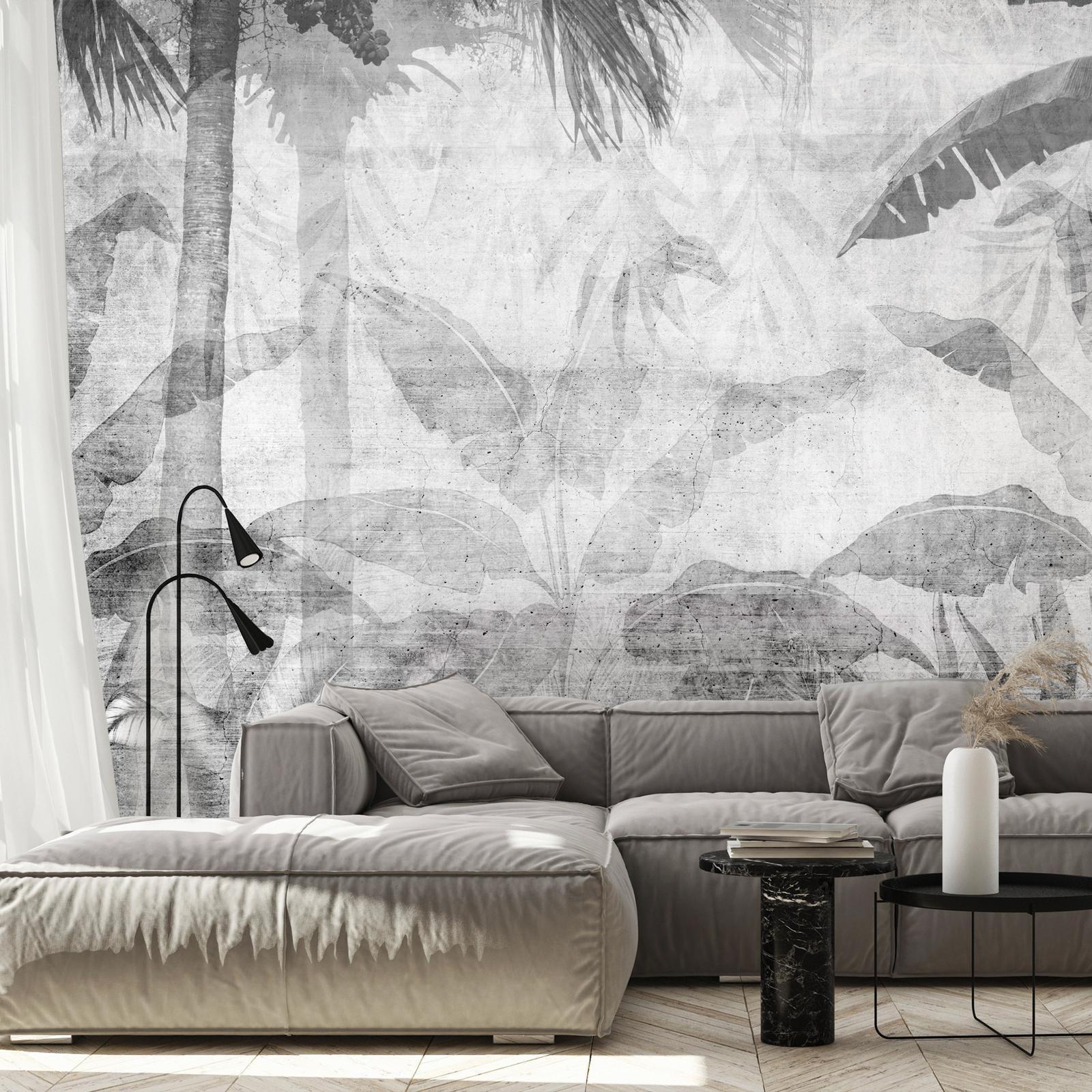 Papier peint - Vanishing jungle - landscape of exotic trees and leaves in grey tones