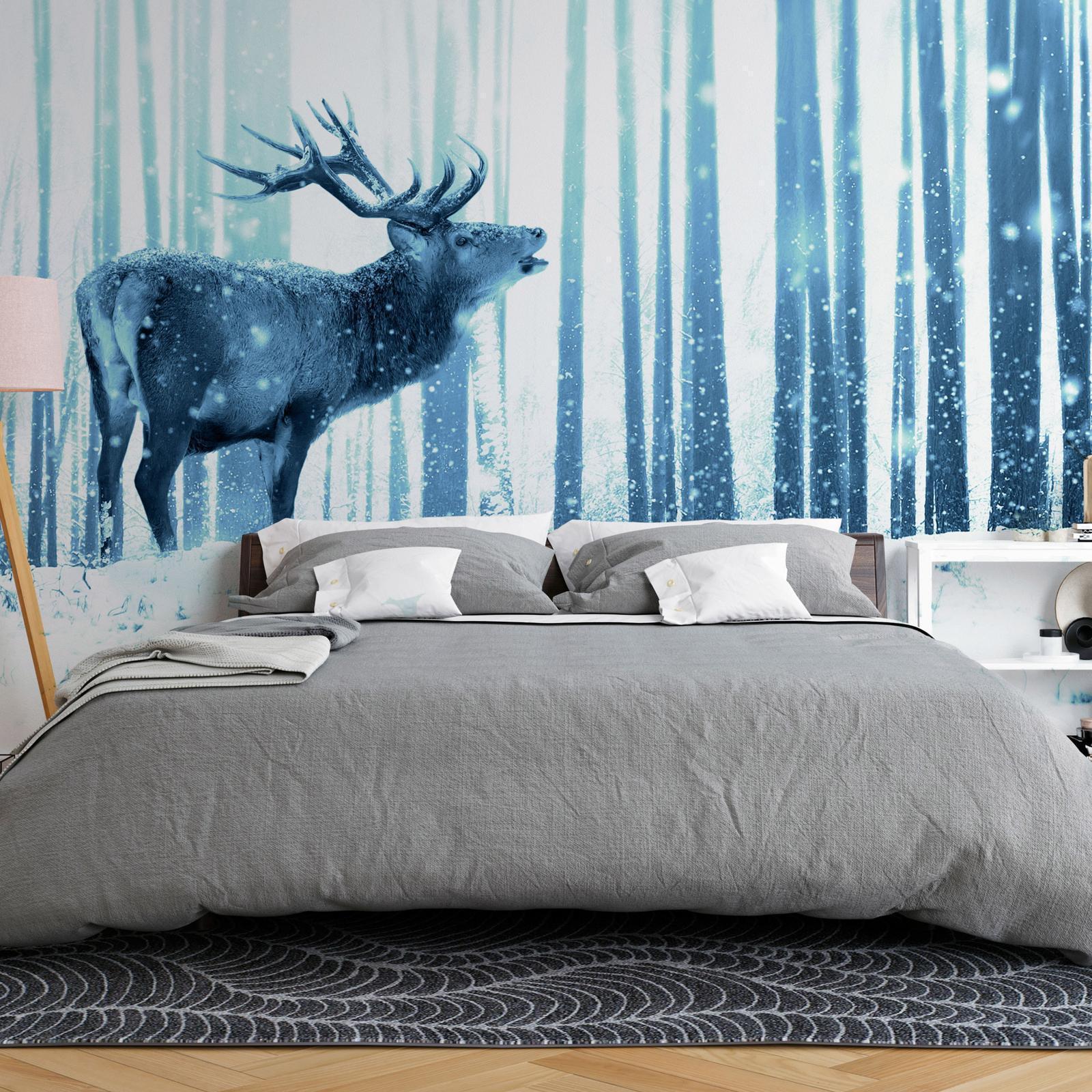 Papier peint - Winter animals - deer motif on a forest background in shades of blue