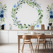 Papier peint - Romantic wreath - plant motif with blue flowers and leaves